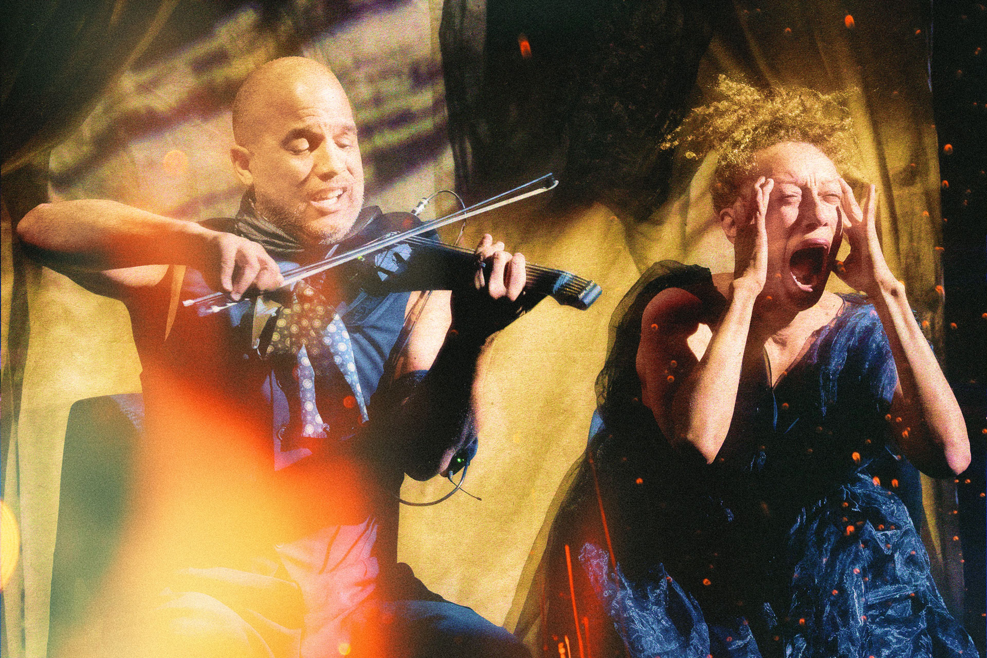 CLOSE UP. A man playing his instrument and a woman screaming.