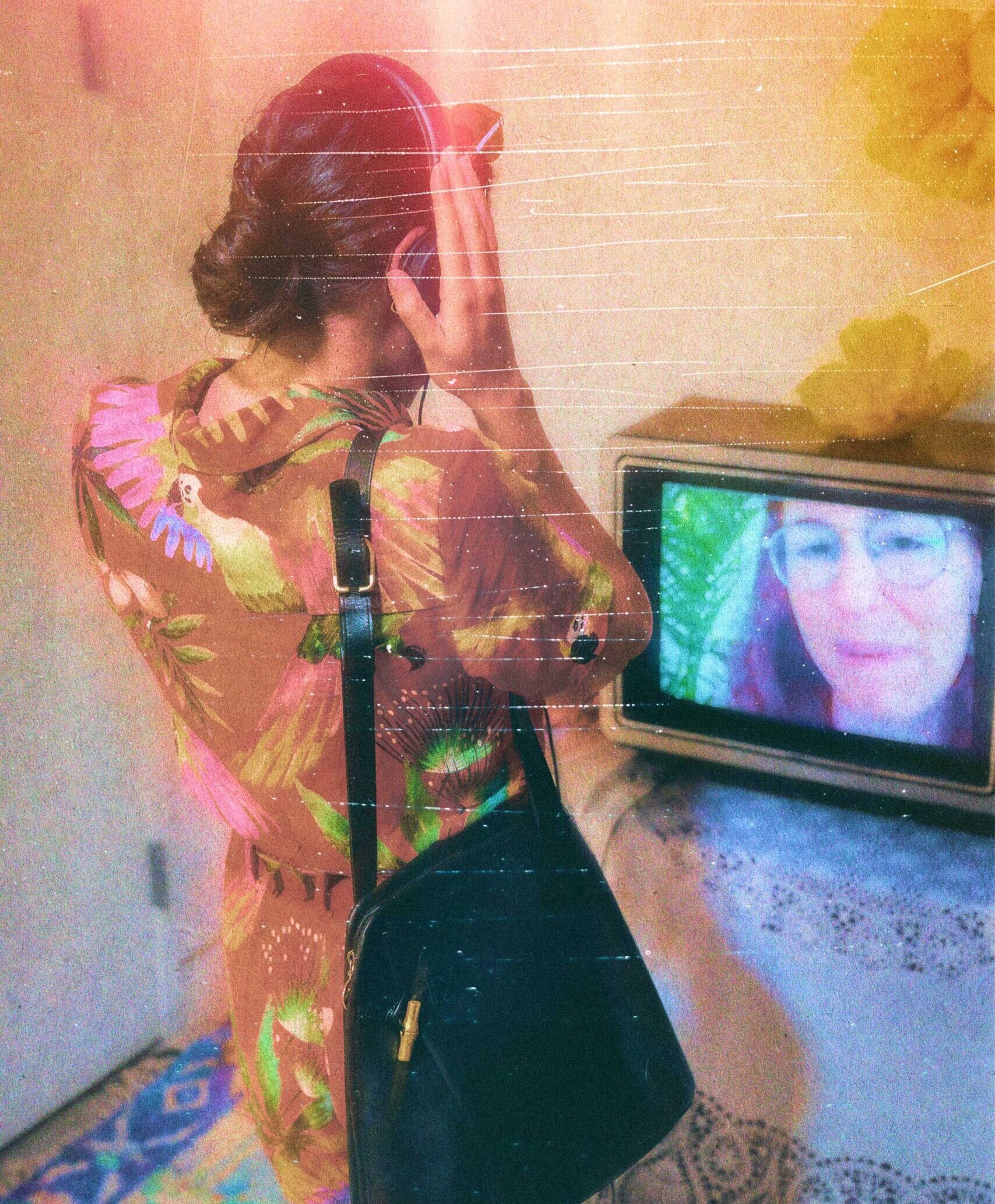 Audience member engaging with a television screen.