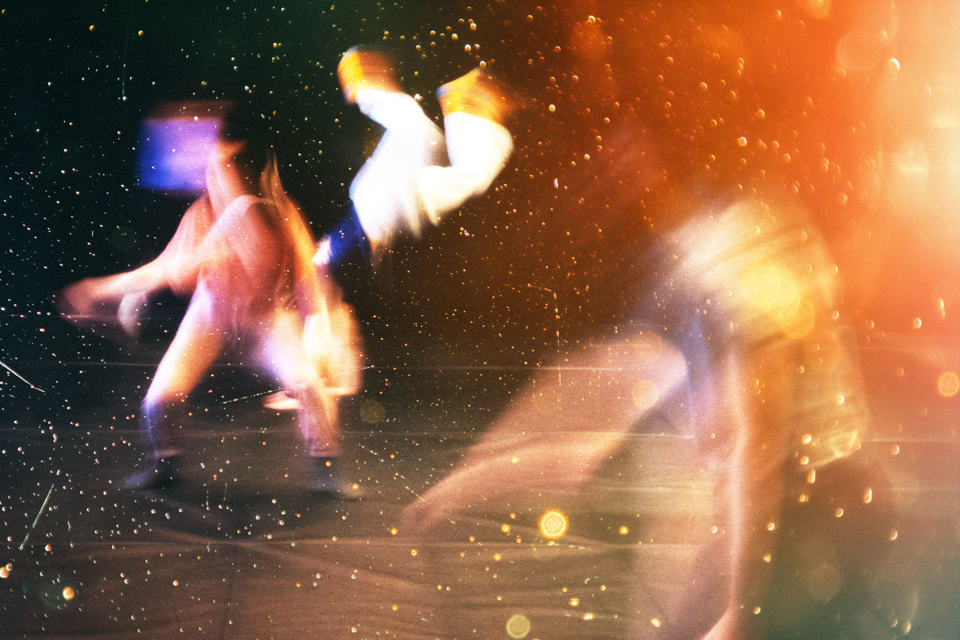 Students moving through a performance space.