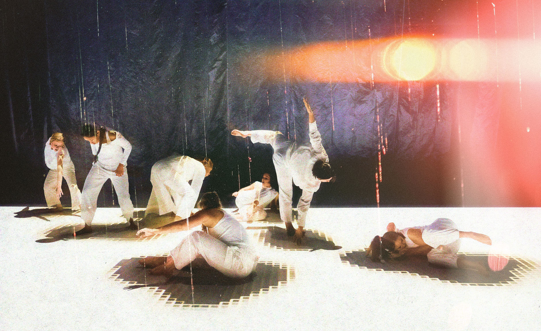 Student performers on a high-tech stage set.