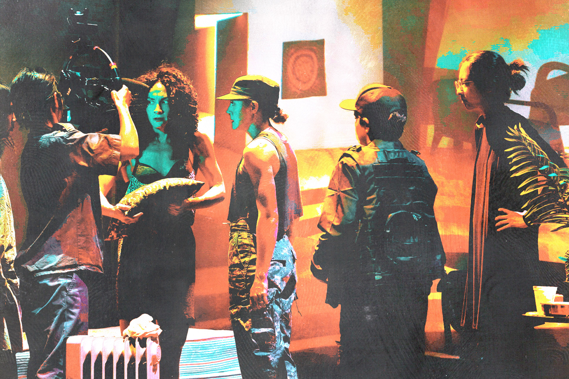 Performers in a play acting out a scene.